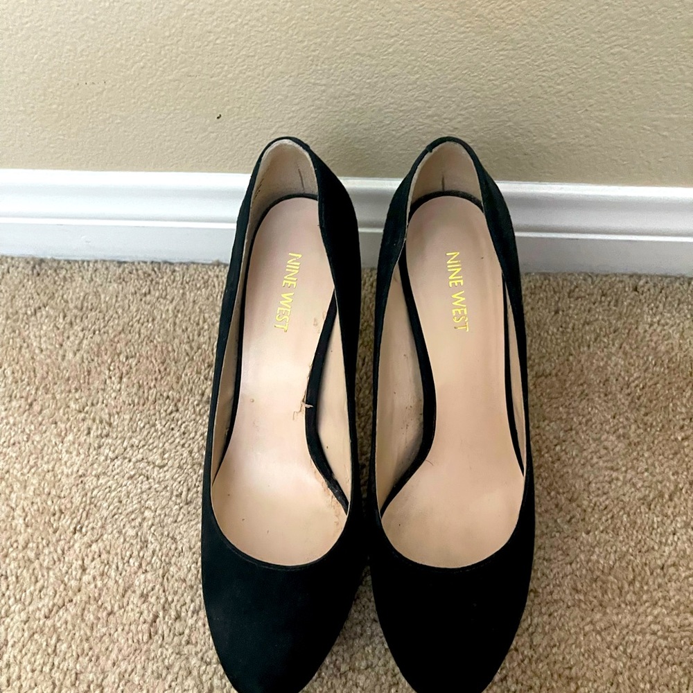 Black suede heel. Nine West. Size 8. Lightly worn. Comfortable heel.